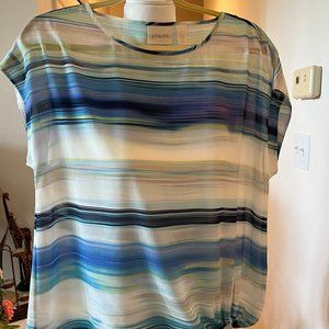 A Chico's top Multi colors Size Small  Brand new